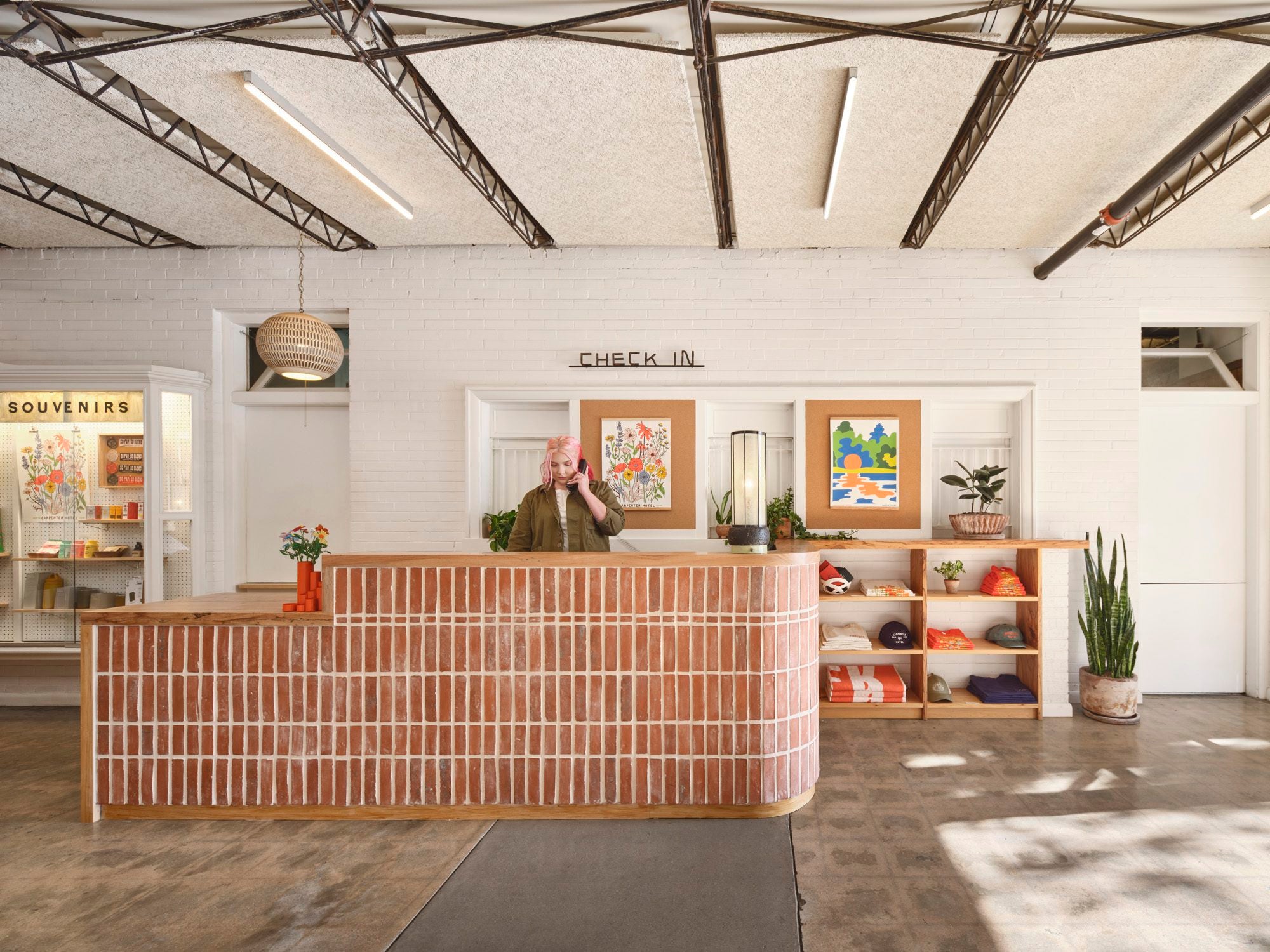 Modern interior design with a check-in counter and decorative elements. Carpenter Hotel in Austin Review of Elseware Unplug products