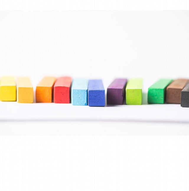 Set of colorful pastel sticks arranged in a straight row on white background – Elseware Unplug art supplies
