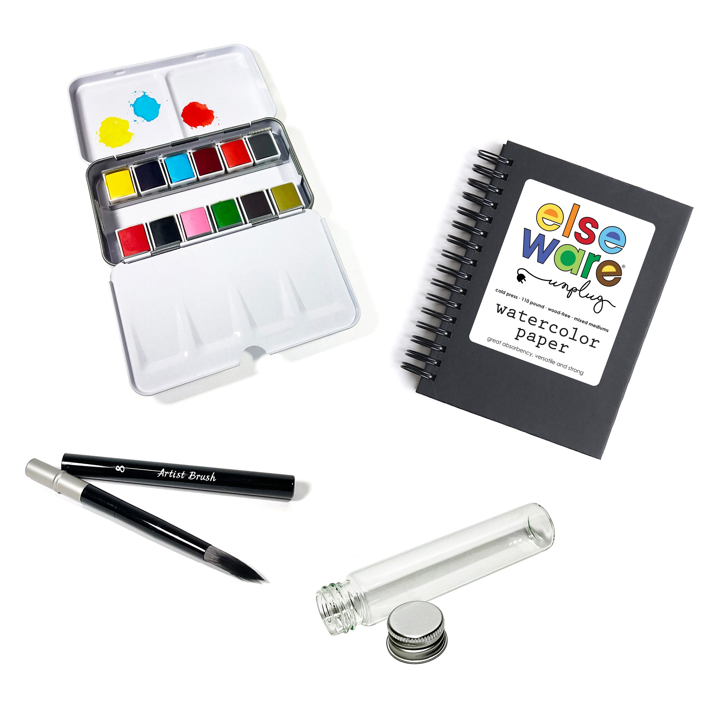 Elseware Unplug Watercolors to Go Kit, featuring a metal watercolor palette with twelve vibrant colors, a spiral-bound watercolor paper pad, a black artist brush, and a glass water vial with a screw-on lid, designed for portable creativity.