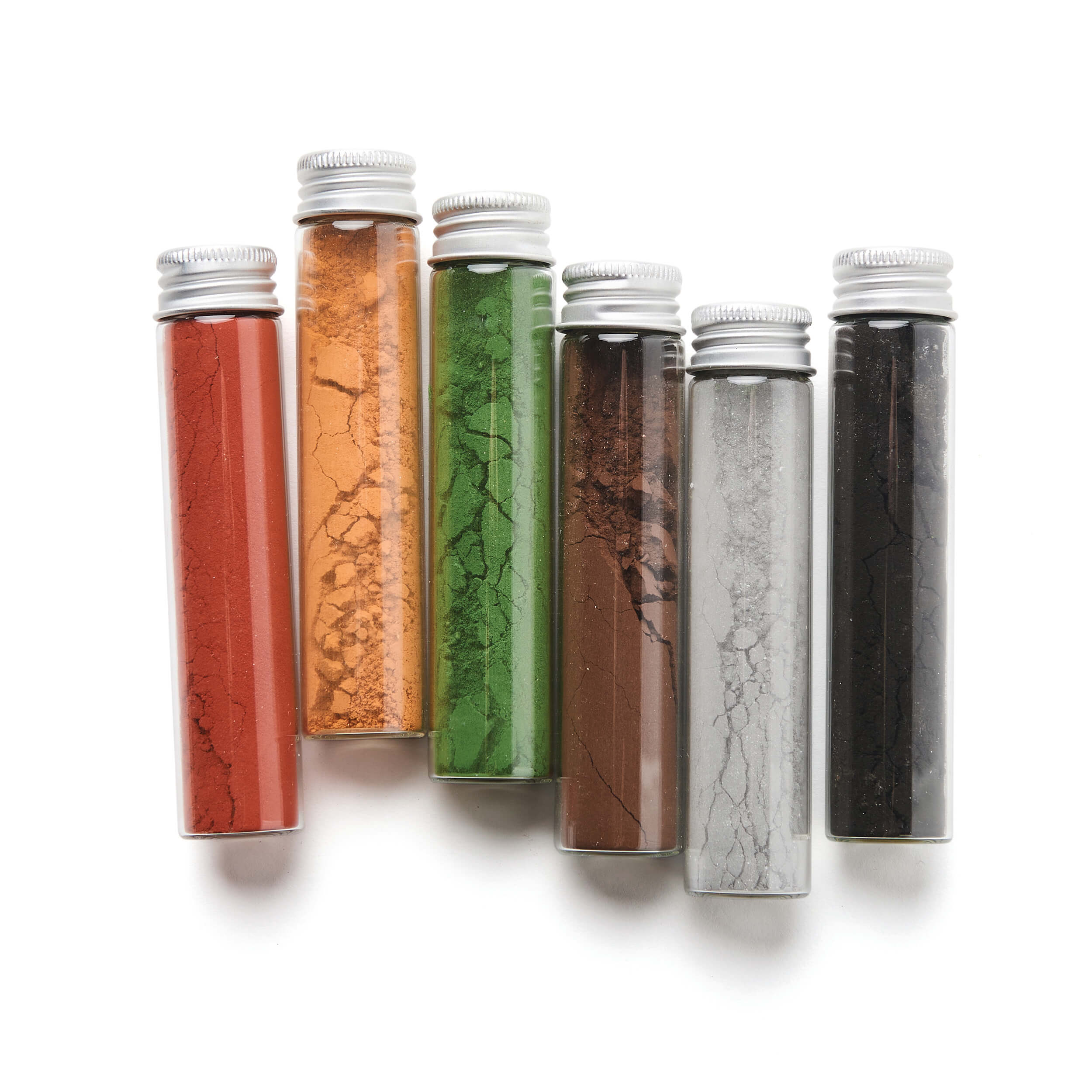 Close-up of six Elseware Unplug Earth Paint pigment vials showing detailed texture and natural color variety from red to black.