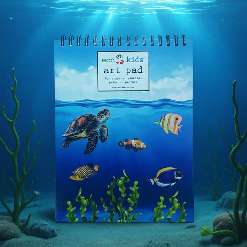 Art pad with ocean design featuring a turtle, fish, and coral on a blue underwater background.