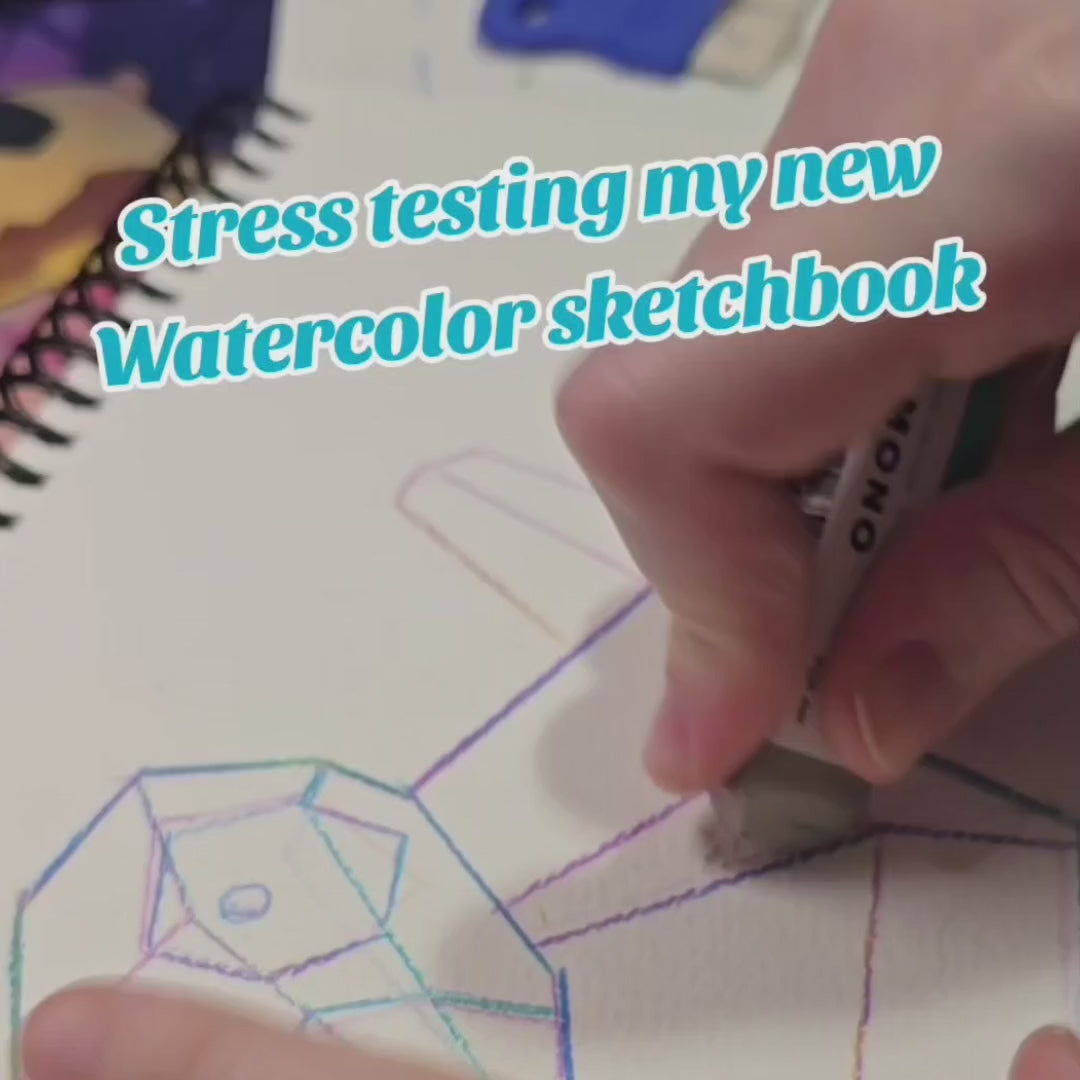 A close-up shot of an artist stress-testing Elseware Unplug's Art Pad. The video captures a hand using an eraser to lighten or correct colored pencil sketches of geometric crystal shapes on thick, textured paper. The text overlay reads, 'Stress testing my new Watercolor sketchbook,' highlighting the durability and versatility of the Elseware Unplug Art Pad for various art techniques.