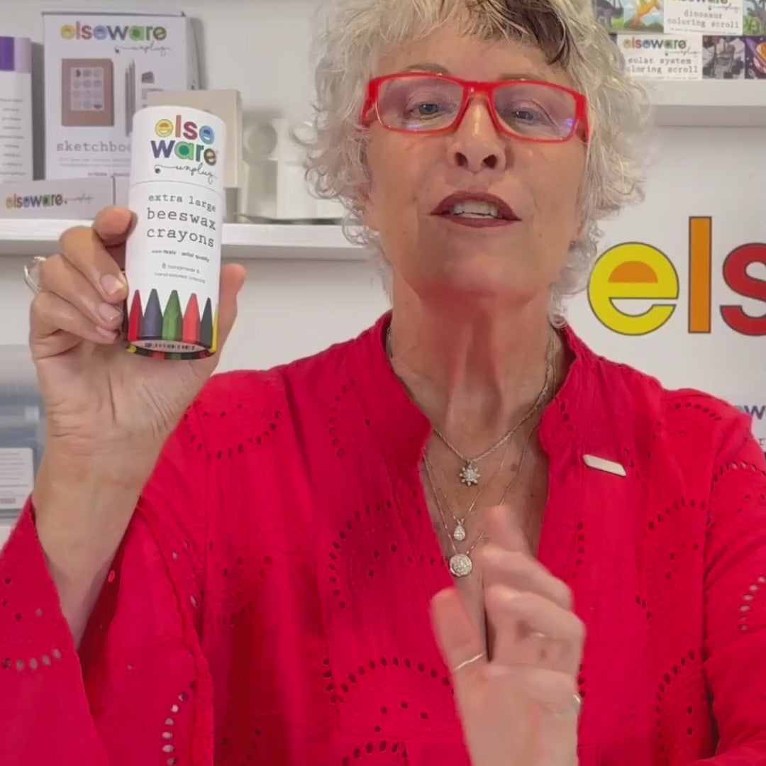 Woman drawing with smooth, vibrant beeswax crayons made from natural ingredients and demonstrating benefits of beeswax crayons