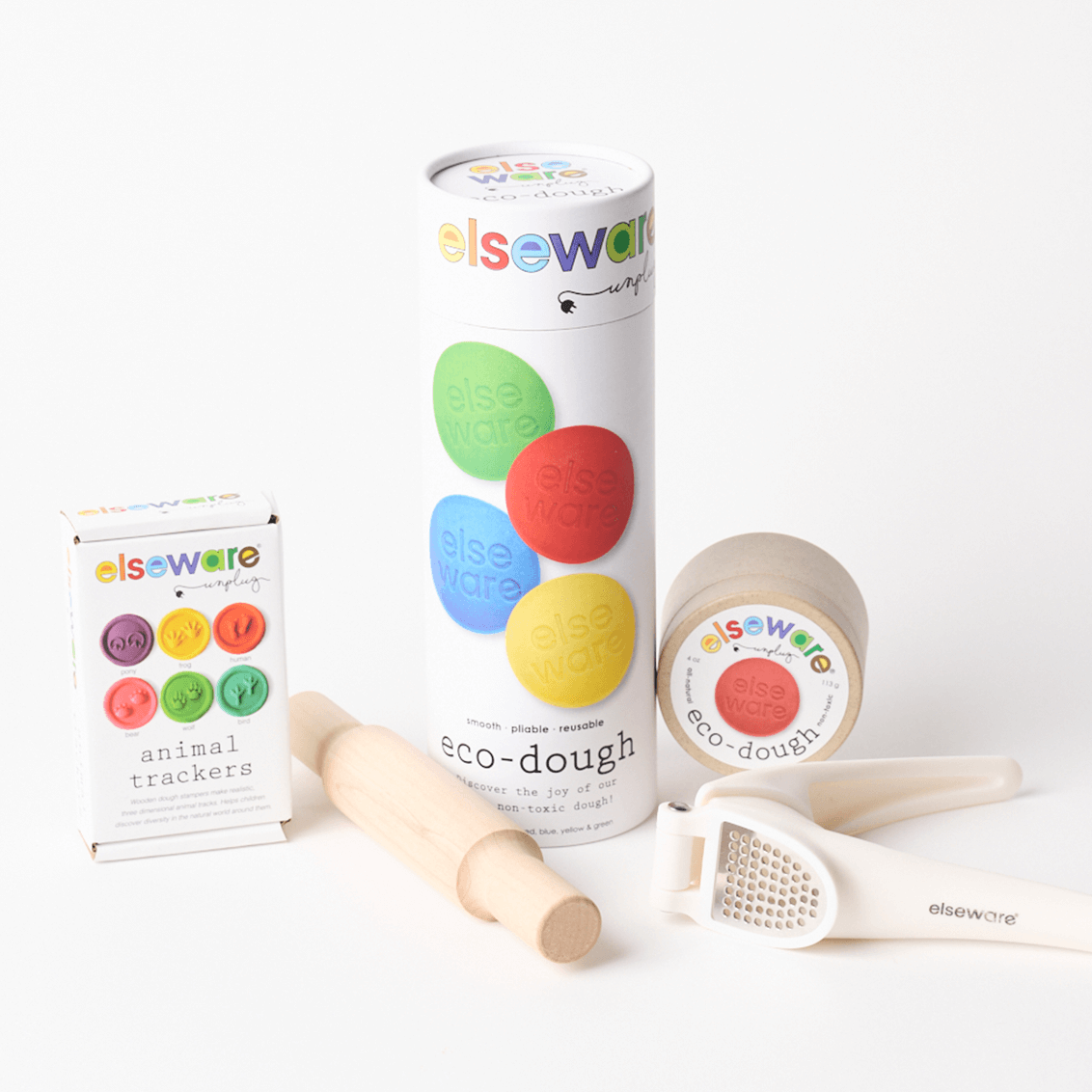 elseware eco-dough packaging with dough tools, and dough press on a white background