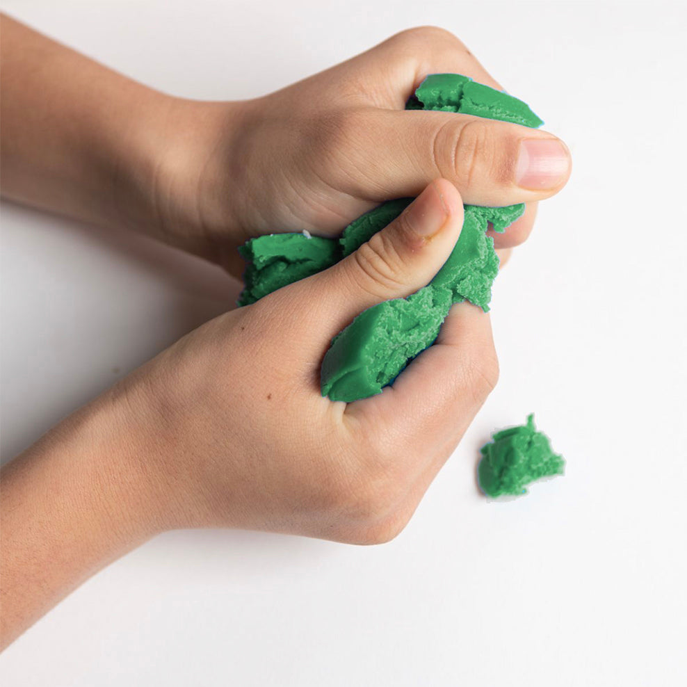 Close-up of hands squeezing Elseware Unplug Eco-Dough, highlighting its soft, moldable texture. This all-natural, non-toxic dough is perfect for sensory play and creative expression, providing a satisfying tactile experience for kids and adults alike.