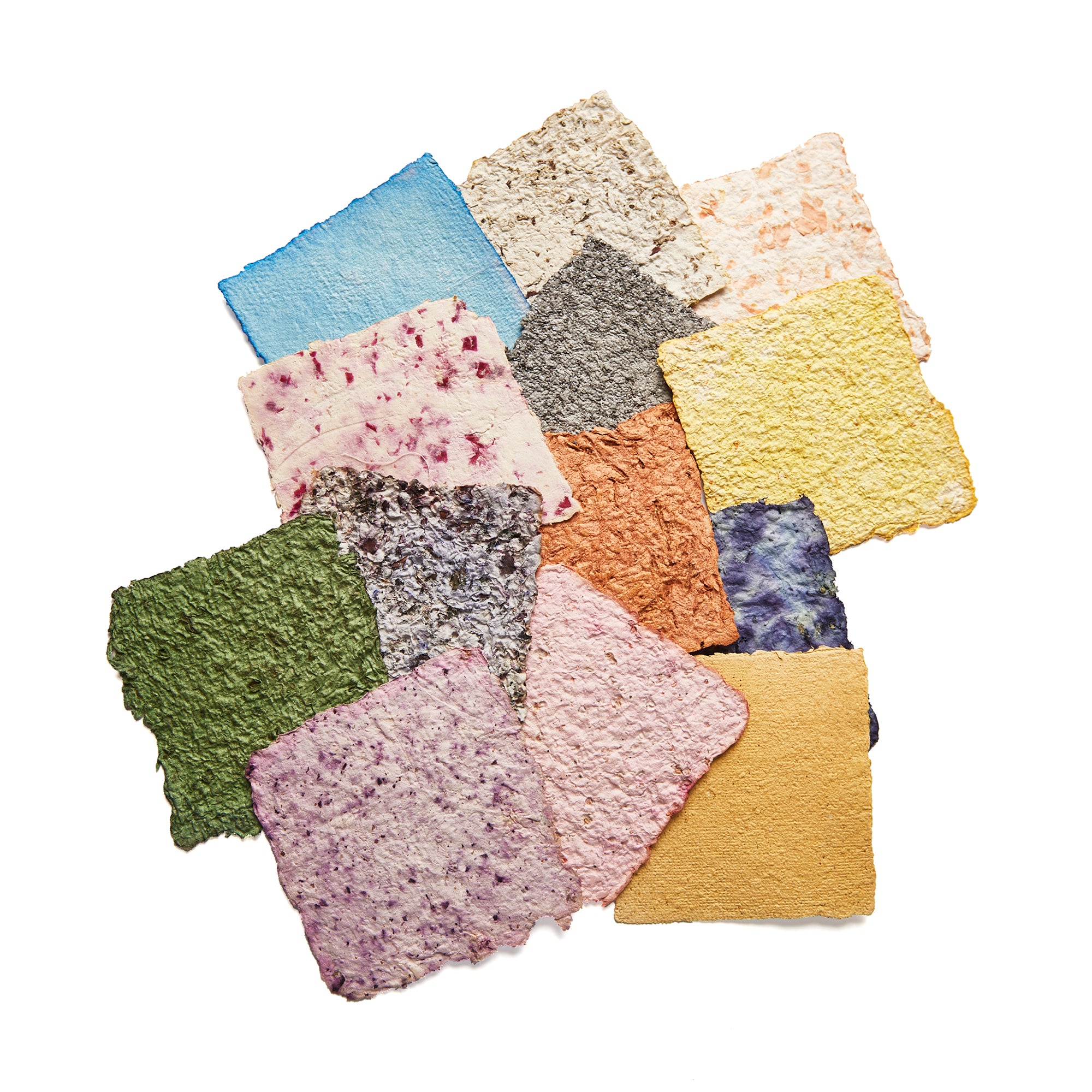 A collection of handmade paper sheets created using the Elseware Unplug Paper Making Kit. Featuring a variety of colors and textures with natural herbal inclusions, these eco-friendly, recycled papers showcase the beauty of sustainable crafting.