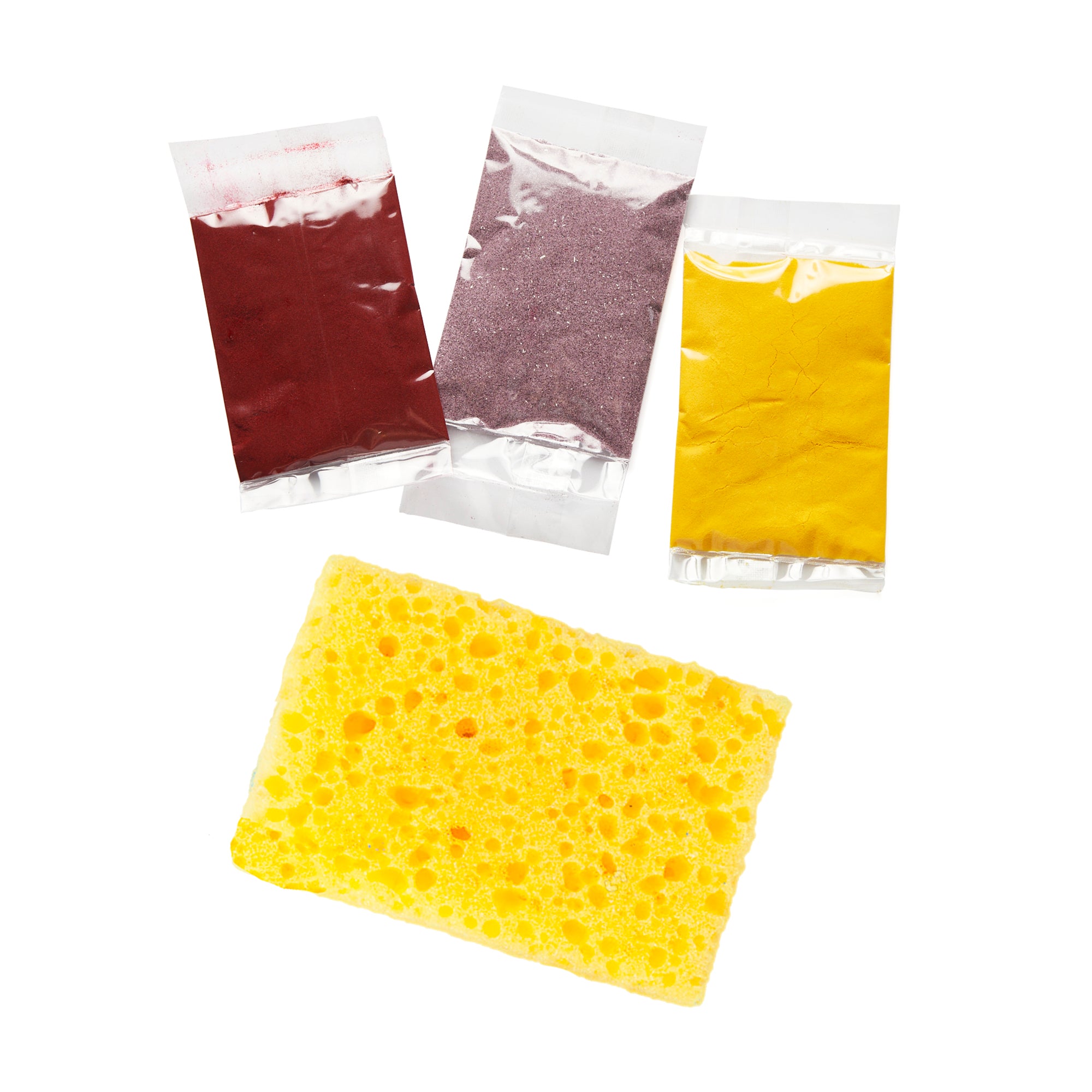 A set of natural color pigments and a sponge from the Elseware Unplug Paper Making Kit. These eco-friendly herbal inclusions enhance the color and texture of handmade paper, offering a creative and sustainable crafting experience for all ages.