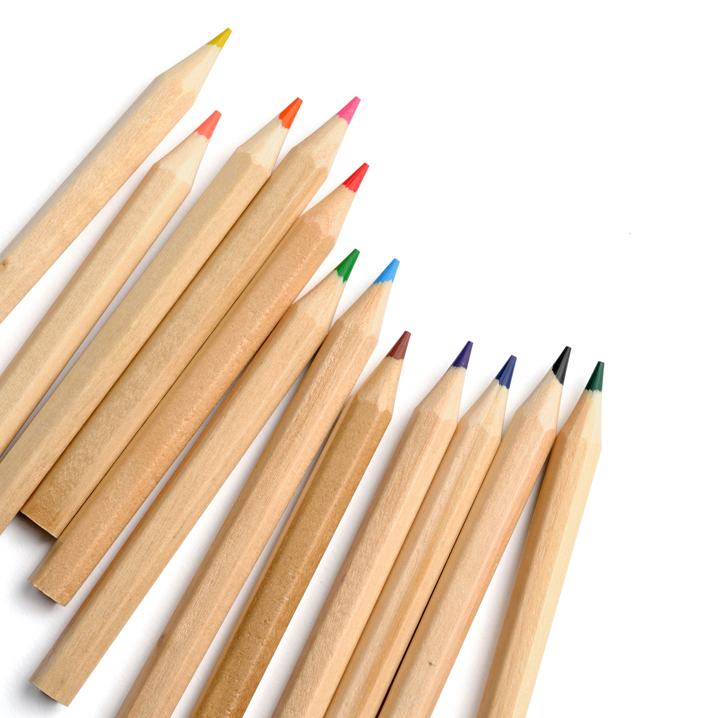 Set of twelve Elseware Unplug pre-sharpened beechwood colored pencils in a variety of vibrant hues, arranged diagonally on a white background. Available in 7-inch full-size or 3.5-inch travel-friendly versions, packaged in a plastic-free, reclosable tube for sustainable, on-the-go creativity.