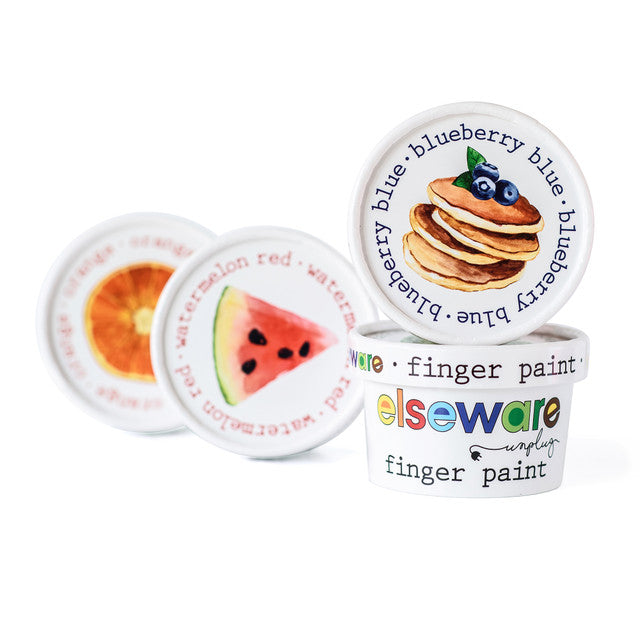 Stack of Elseware Unplug finger paints showing blueberry, watermelon, and orange lid illustrations inspired by real fruits.