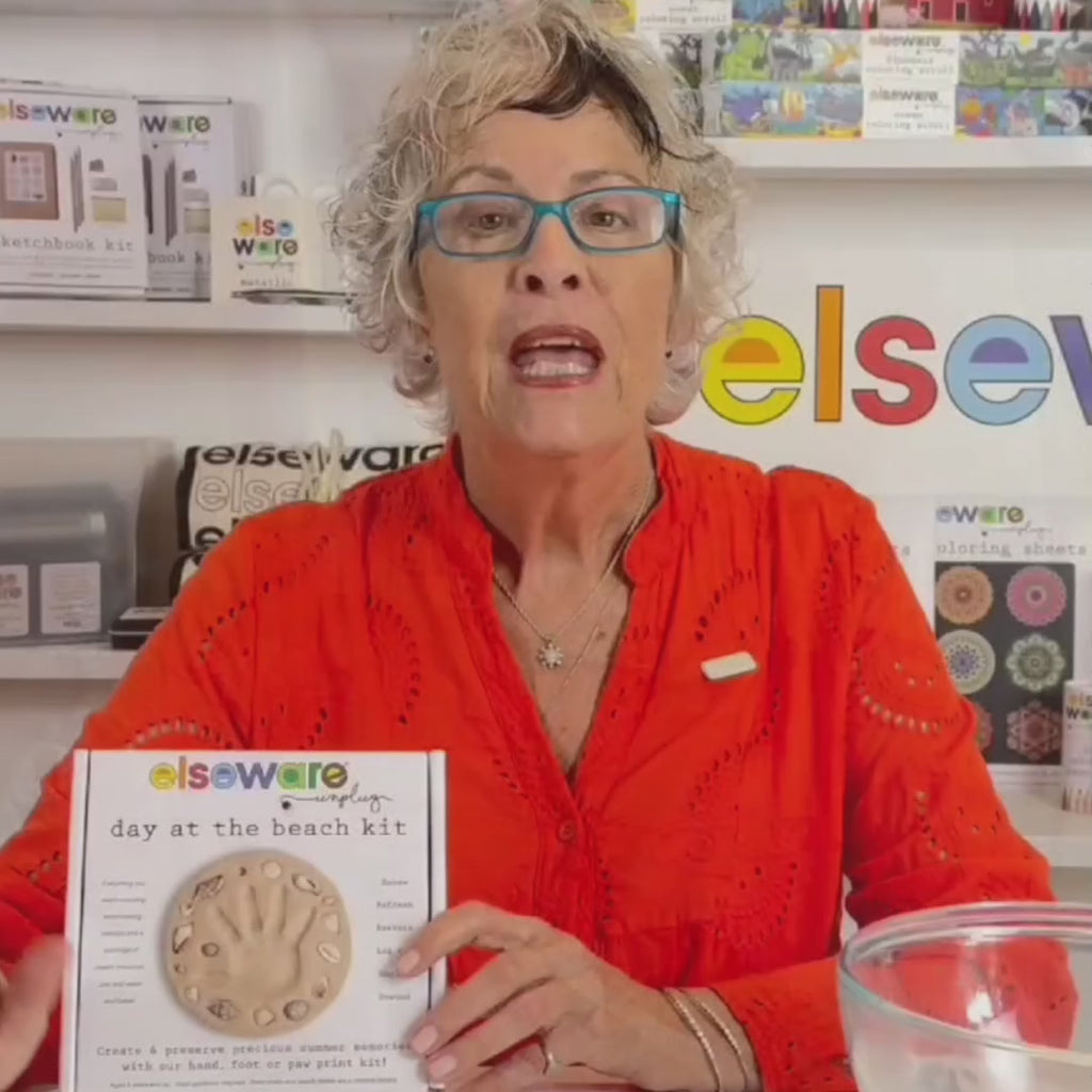Elseware Unplug Day at the Beach DIY Kit product demo woman in red shirt holding box video 2of 2