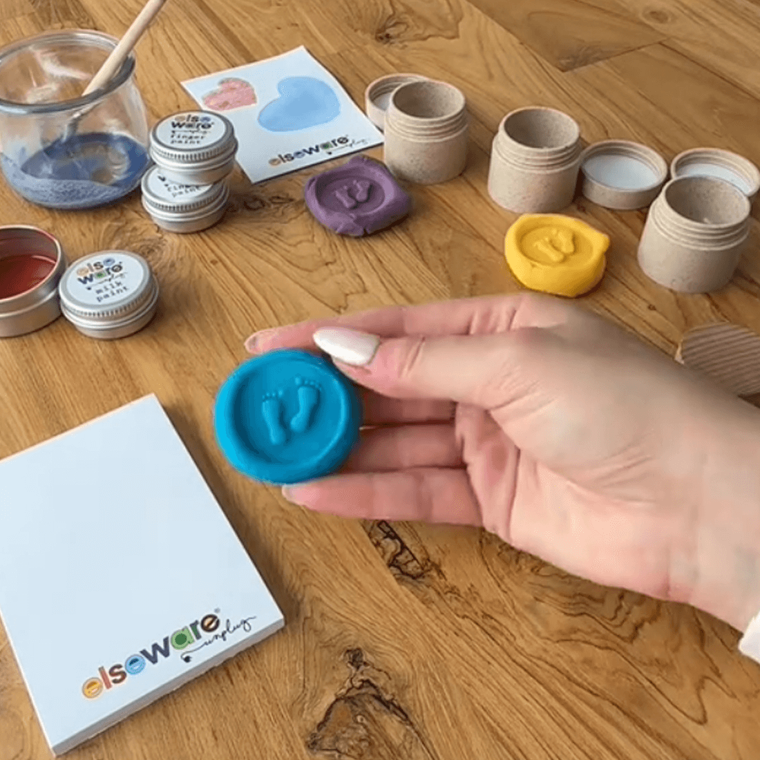 Woman introduces the Elseware Unplug Sample Kit featuring eco-dough, finger paint, animal trackers, and colored pencils — a hands-on look at our top sensory best sellers.